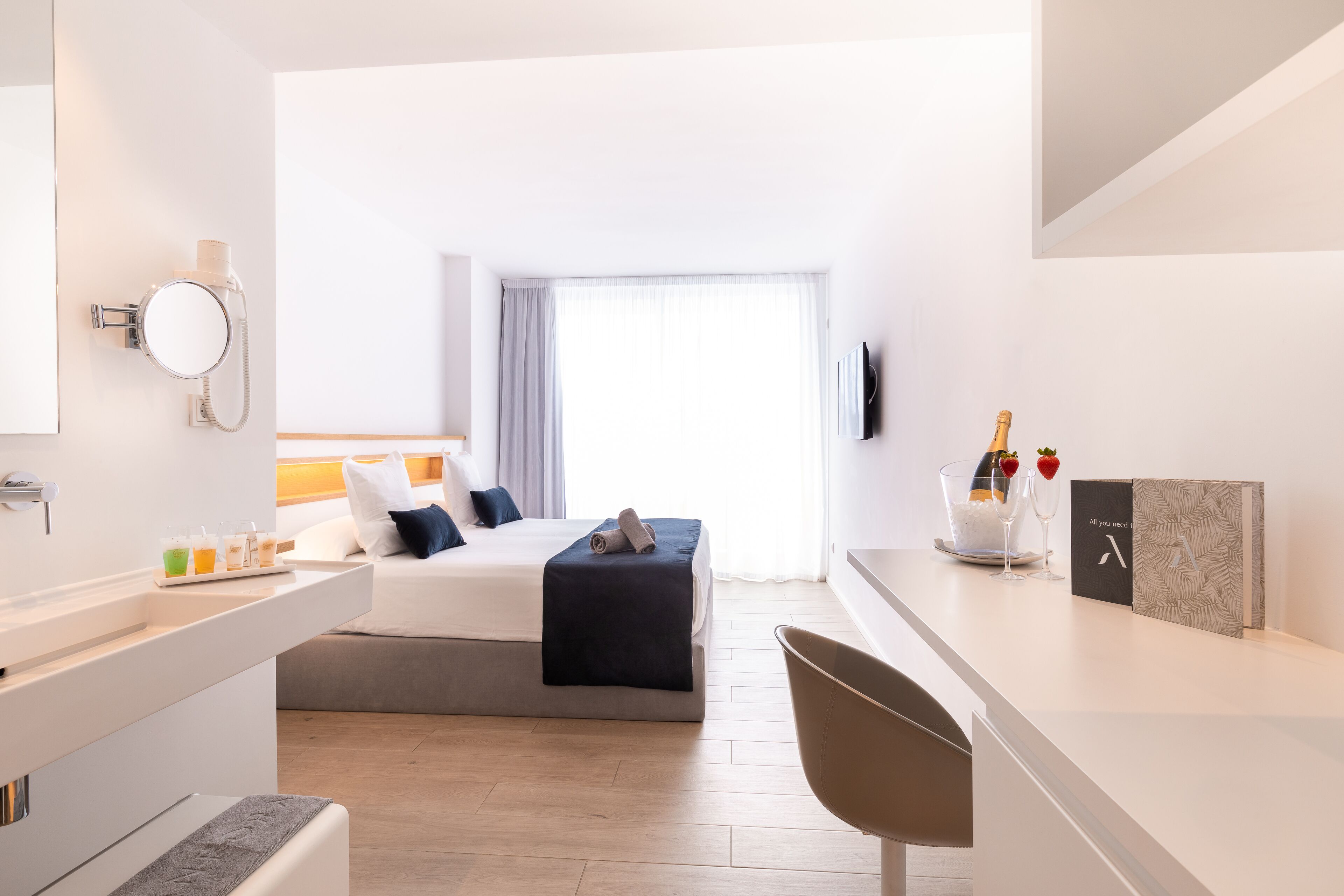 Premium bedding, down comforters, memory foam beds, minibar