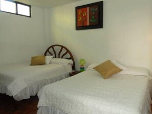 Twin Room, 2 Single Beds | Bathroom | Shower, free toiletries, hair dryer, towels
