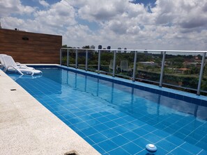 Outdoor pool, sun loungers