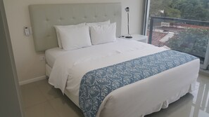 Premium bedding, down duvets, memory-foam beds, in-room safe
