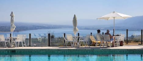 3 outdoor pools, open 9:00 AM to 9:00 PM, pool umbrellas, sun loungers