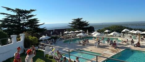 3 outdoor pools, open 9:00 AM to 9:00 PM, pool umbrellas, sun loungers