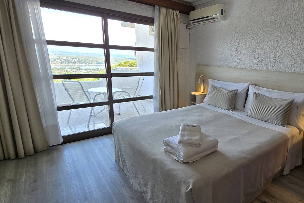 Studio, Balcony, Lake View | In-room safe, blackout curtains, iron/ironing board