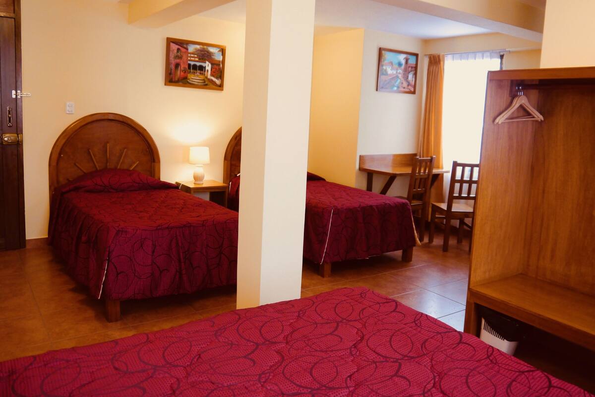 Family Triple Room, 1 Bedroom, Garden View | Premium bedding, in-room safe, desk, free cots/infant beds