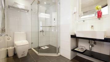 Shower, free toiletries, hair dryer, slippers