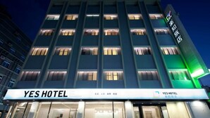 A YES HOTEL building with illuminated windows and a signboard. - Yes Hotel (Taitung)