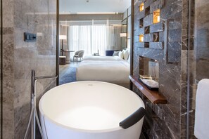Deluxe Twin Size Bed Room | Bathroom | Separate tub and shower, deep soaking tub, rainfall showerhead