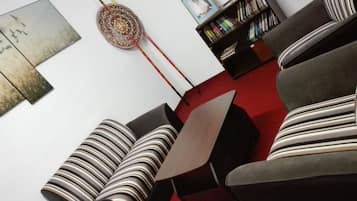 Chambre Triple Deluxe, 1 chambre, vue montagne | Coin séjour