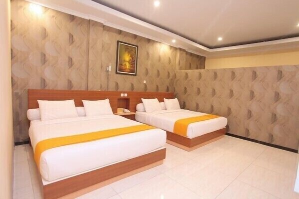 Habitación Deluxe (Double Double) | Minibar, escritorio, cortinas blackout y wifi gratis 