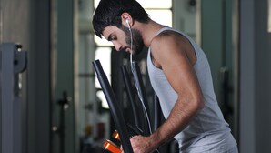 A person using exercise equipment in a gym. - Cross Health Center (Yerevan)