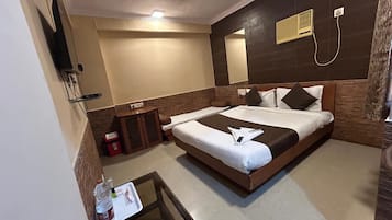 Deluxe Room | Premium bedding, memory-foam beds, in-room safe, individually decorated