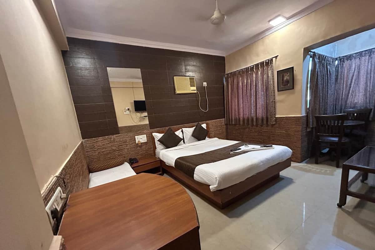 Habitación Deluxe | Ropa de cama de alta calidad y camas con efecto memoria