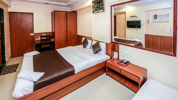 Premium bedding, memory-foam beds, minibar, in-room safe