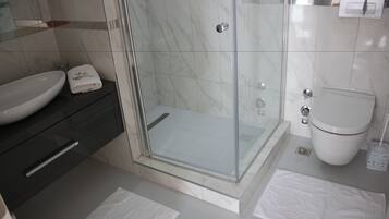 Apartment, 2 Bedrooms | Bathroom | Shower, free toiletries, hair dryer, towels