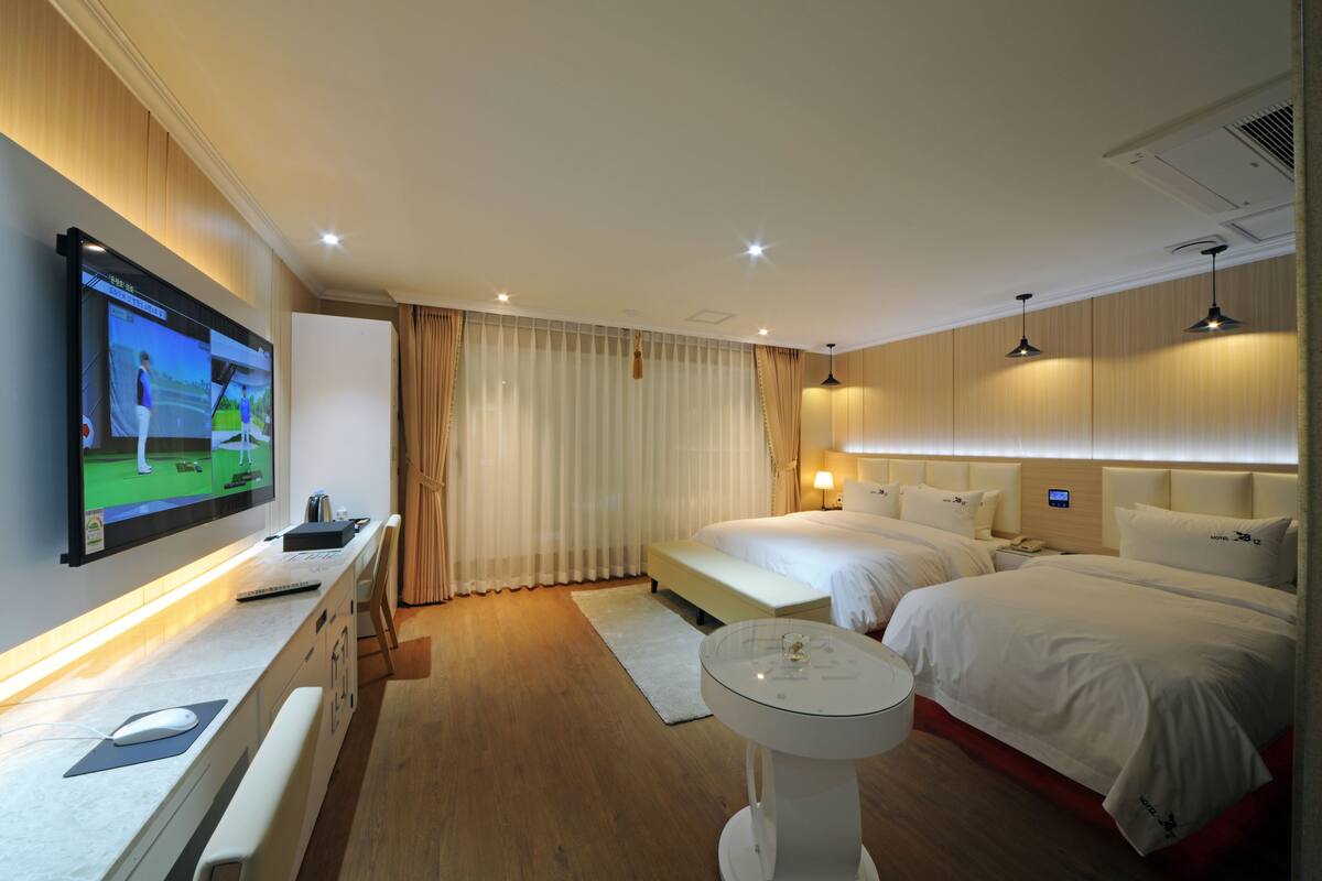 Habitación Deluxe con 2 camas individuales | Wifi gratis y ropa de cama