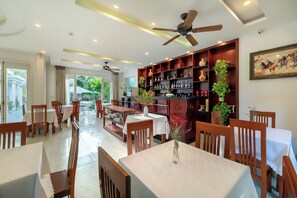 Breakfast, lunch served; local and international cuisine, pool views  - Hoi An Palmy Villa (Da Nang)
