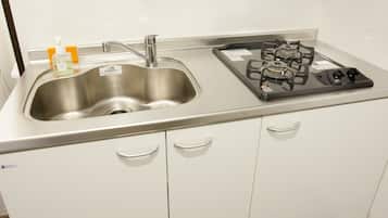 Fridge, microwave, stovetop, cookware/dishes/utensils