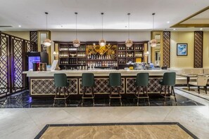 3 bars/lounges, poolside bar