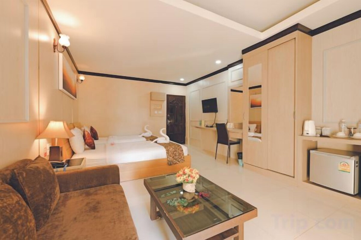 Minibar, bureau, rideaux d’obscurcissement, lit d’appoint (supplément)