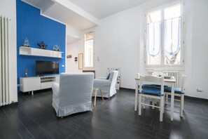 Apartment, 1 Bedroom | Living area | Flat-screen TV - Opera House (Bologna)