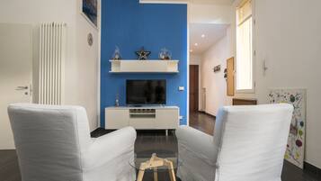 Apartemen, 1 kamar tidur | Area keluarga | TV layar datar