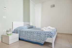 Apartment, 1 Bedroom | Premium bedding, in-room safe, soundproofing, iron/ironing board - Appartamenti Marina Salivoli (Piombino)