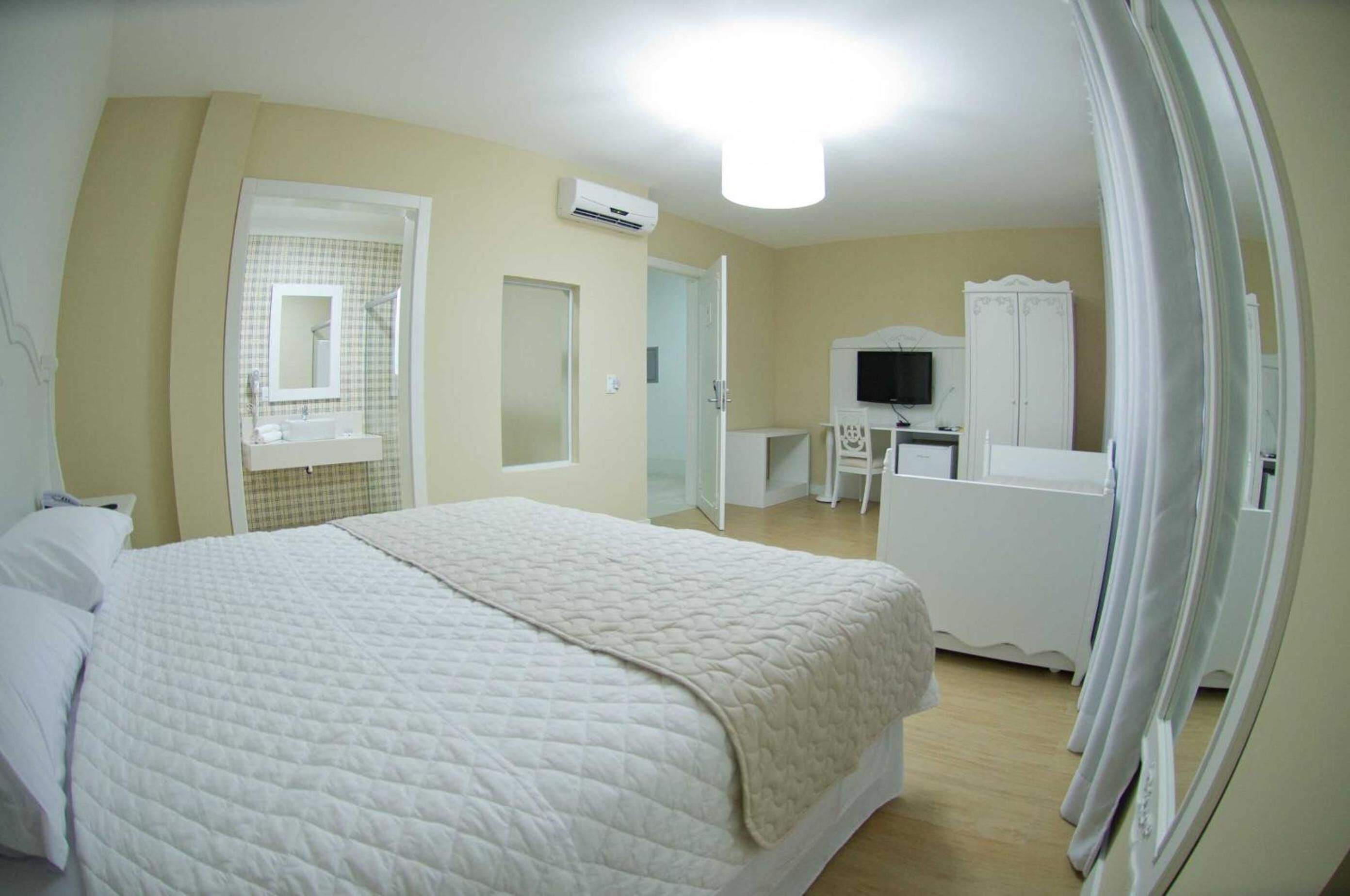 minibar, desk, blackout curtains, iron/ironing board