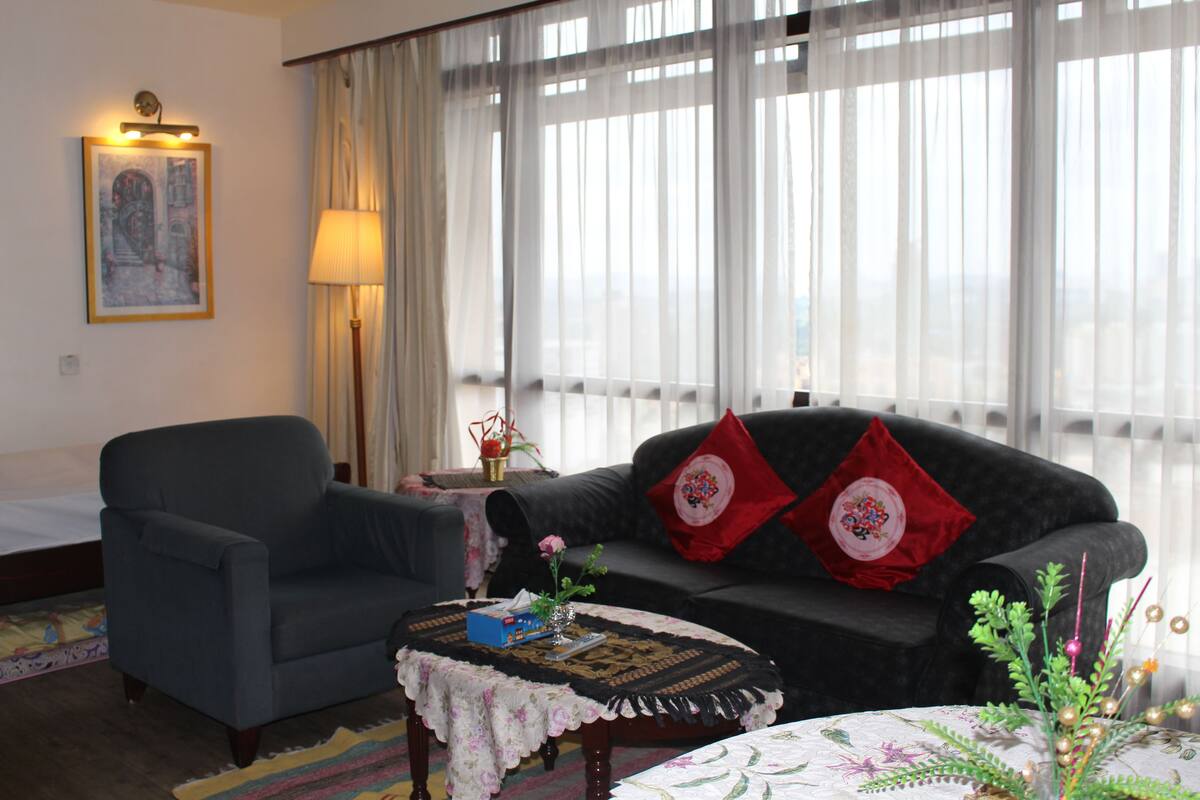 Deluxe Room | In-room safe, desk, iron/ironing board, free cots/infant beds