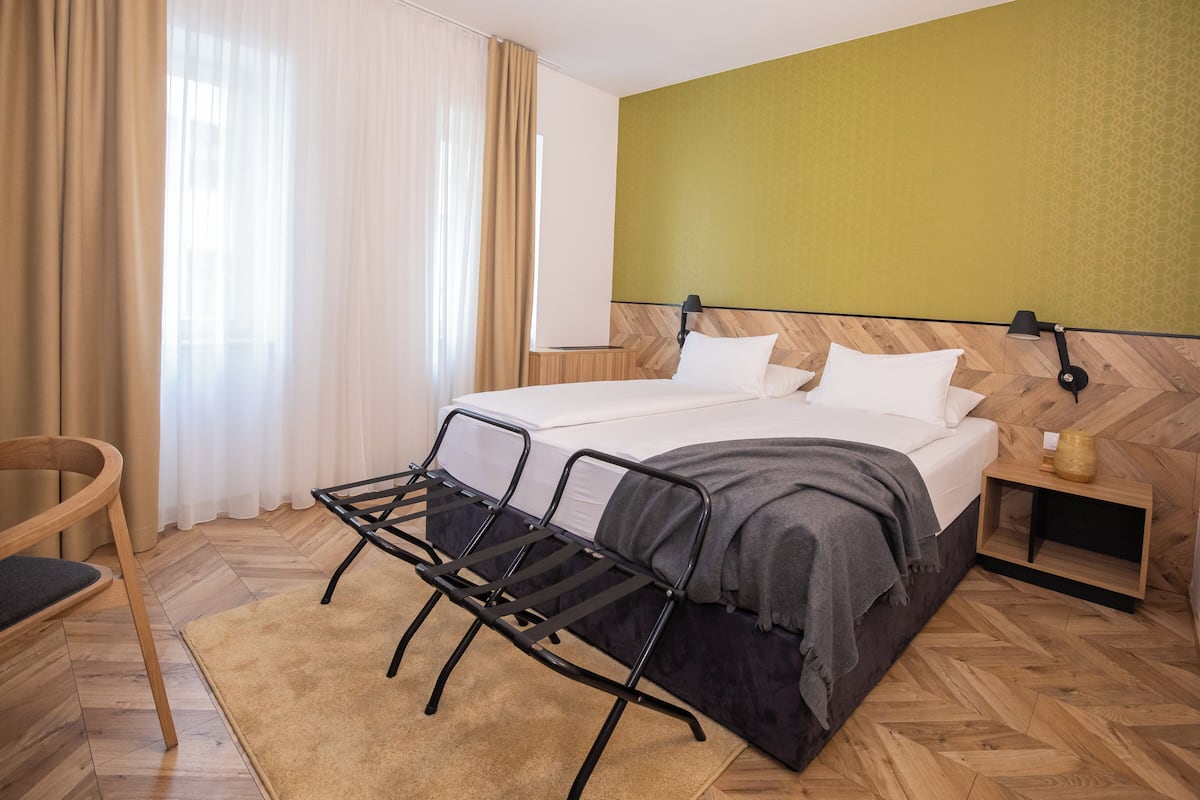 Standard Double or Twin Room | Minibar, in-room safe, desk, laptop workspace