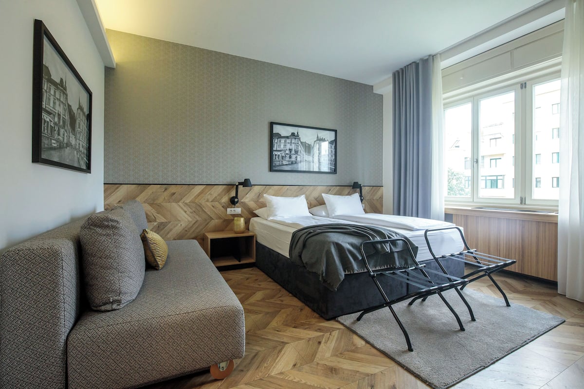 comfort double or twin room, multiple beds, park view | 1 bedroom, minibar, in-room safe, desk