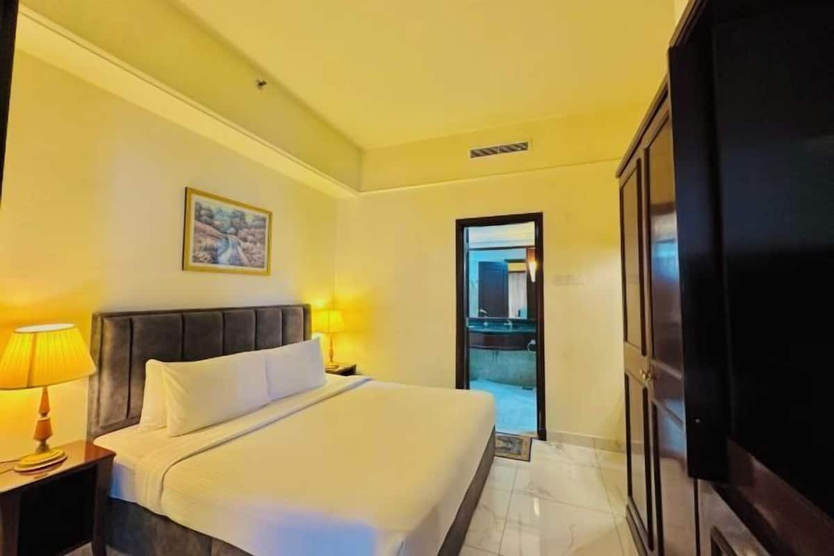 Premium bedding, laptop workspace, soundproofing, iron/ironing board