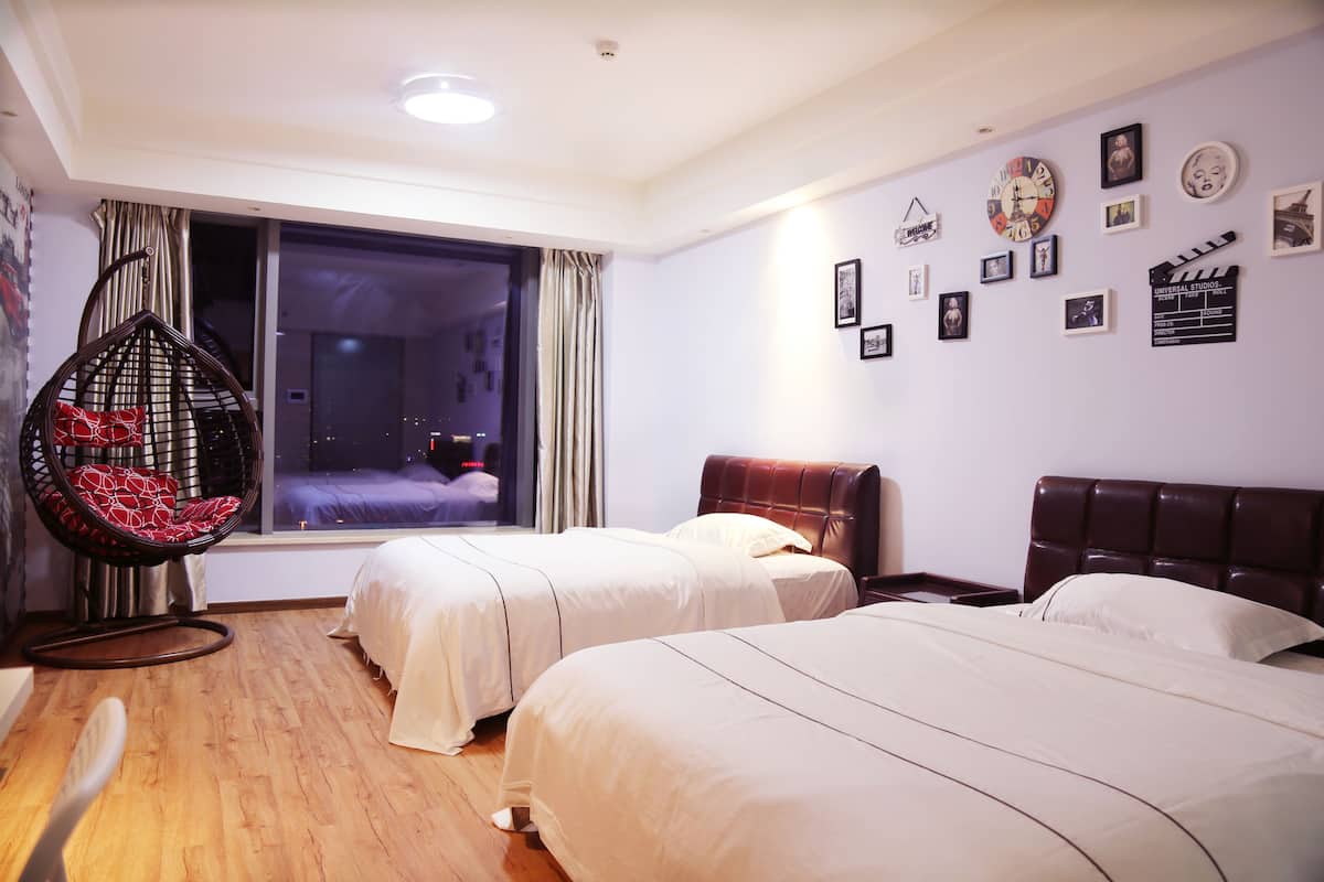 Desk, blackout curtains, iron/ironing board, rollaway beds