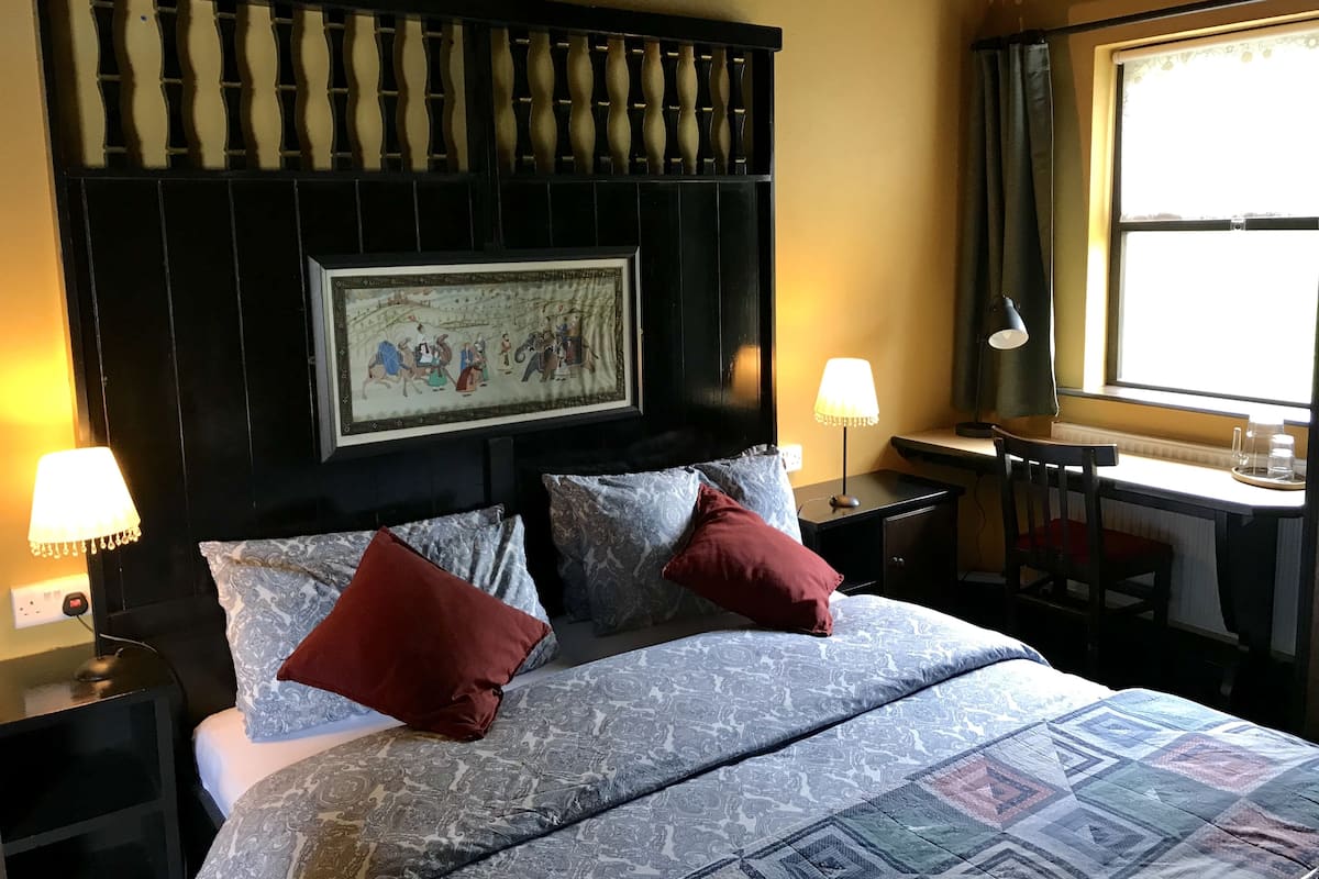 Economy Double Room, 1 King Bed, Annex Building | Desk, free WiFi, bed sheets
