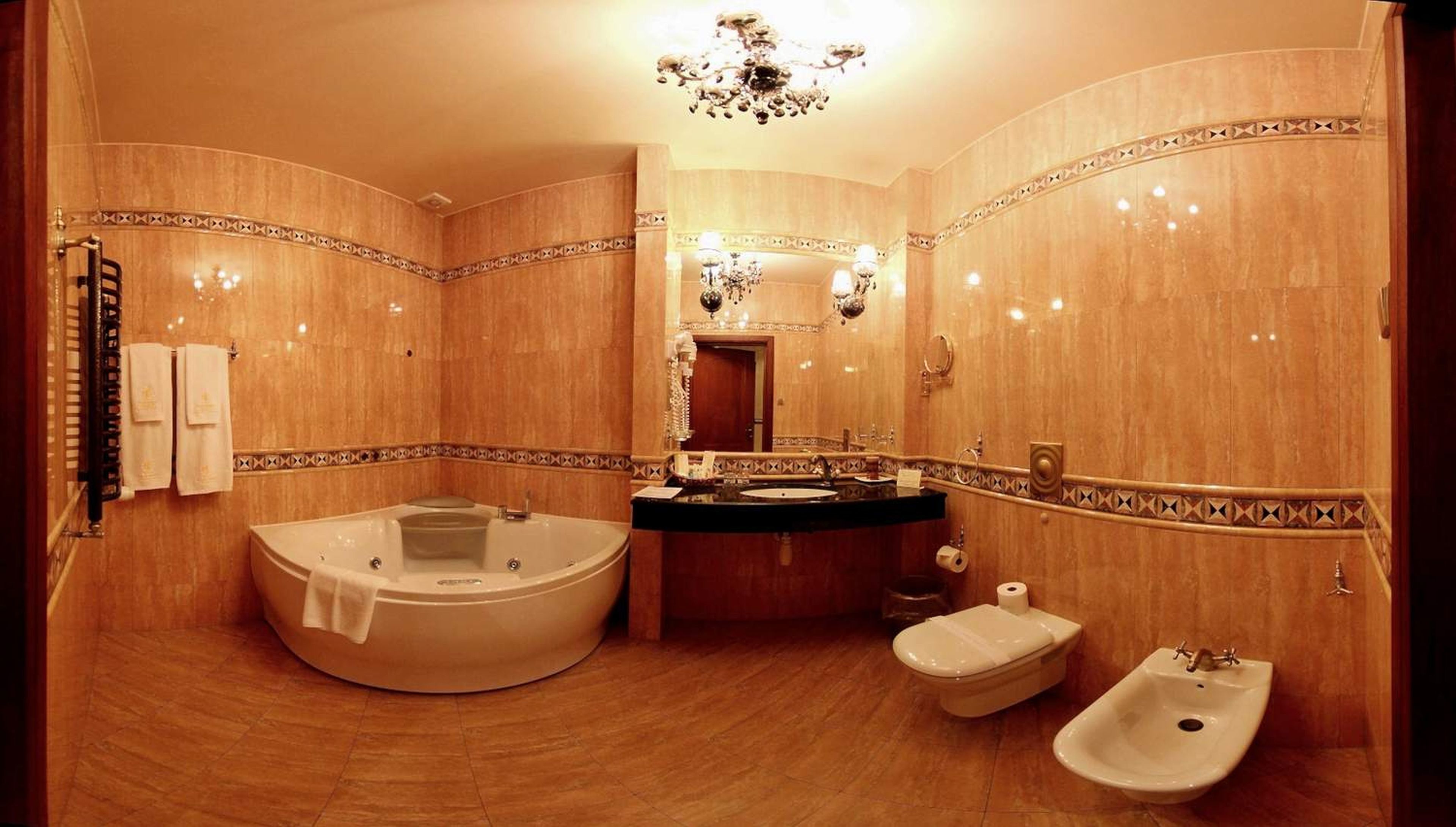 superior double room | bathroom | shower, free toiletries, hair dryer, bathrobes