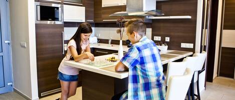 Apartment, 1 Bedroom, Balcony | Private kitchen | Fridge, microwave, stovetop, coffee/tea maker