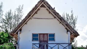 Family Quadruple Room, 2 Double Beds, Sea View | In-room safe, desk, bed sheets