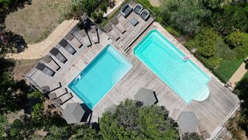 2 outdoor pools, open 8:00 AM to 8:00 PM, pool umbrellas, pool loungers