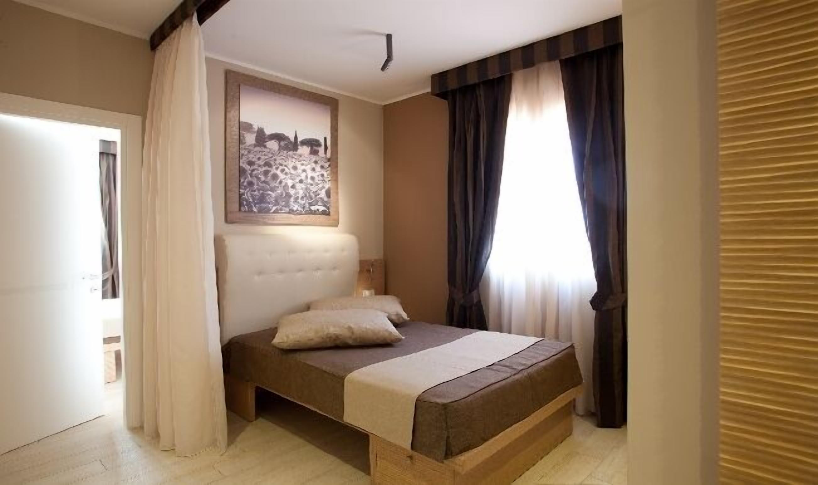 junior suite, kitchenette, hill view | frette italian sheets, premium bedding, minibar, in-room safe