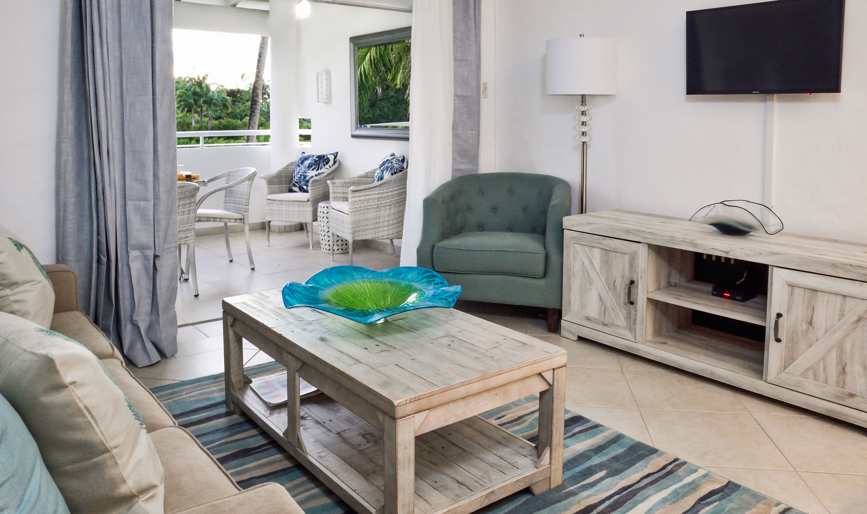 Deluxe Condo, 1 Bedroom, Garden View | Living area | LCD TV