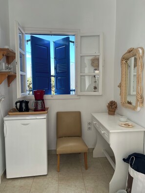 Double or Twin Room, Partial Sea View, Ground Floor | Living area - Heliotropio Studios & Apartments (Milos)