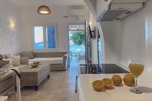 Apartment, Sea View | Living area - Heliotropio Studios & Apartments (Milos)