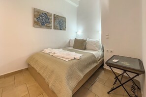Apartment, 1 Bedroom, Sea View | Hypo-allergenic bedding, in-room safe, soundproofing, iron/ironing board - Heliotropio Studios & Apartments (Milos)
