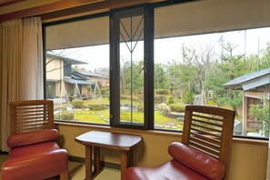 Japanese Western Style Duplex, Open Air Bath | Living area | Flat-screen TV - Ryotei Manyou (Nomi)