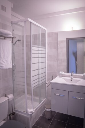 Shower, free toiletries, hair dryer, towels