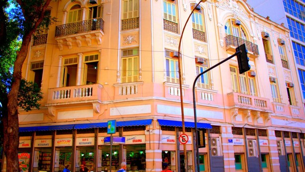 A multi-story building with a classic architectural style, featuring balconies and large windows. - Massape Rio Hostel (Rio de Janeiro)