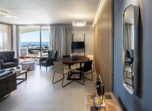 Premium Apartment, 2 Bedrooms, Sea View (Family) | Living area | 22-inch flat-screen TV with satellite channels, LCD TV - Marina Alimos Hotel Apartments (Alimos)