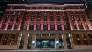 A historic building with a prominent entrance labeled "The Metcalfe." It features a classic architectural style with a symmetrical facade, large windows, and a central entrance with a decorative canopy. - Metcalfe Hotel Ottawa by Gray Collection (Ottawa)