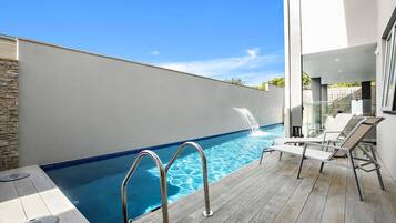 Seasonal outdoor pool, open 7:30 AM to 7:30 PM, sun loungers