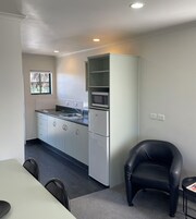 Two Bedroom Apartment | Private kitchen | Microwave, coffee/tea maker, electric kettle