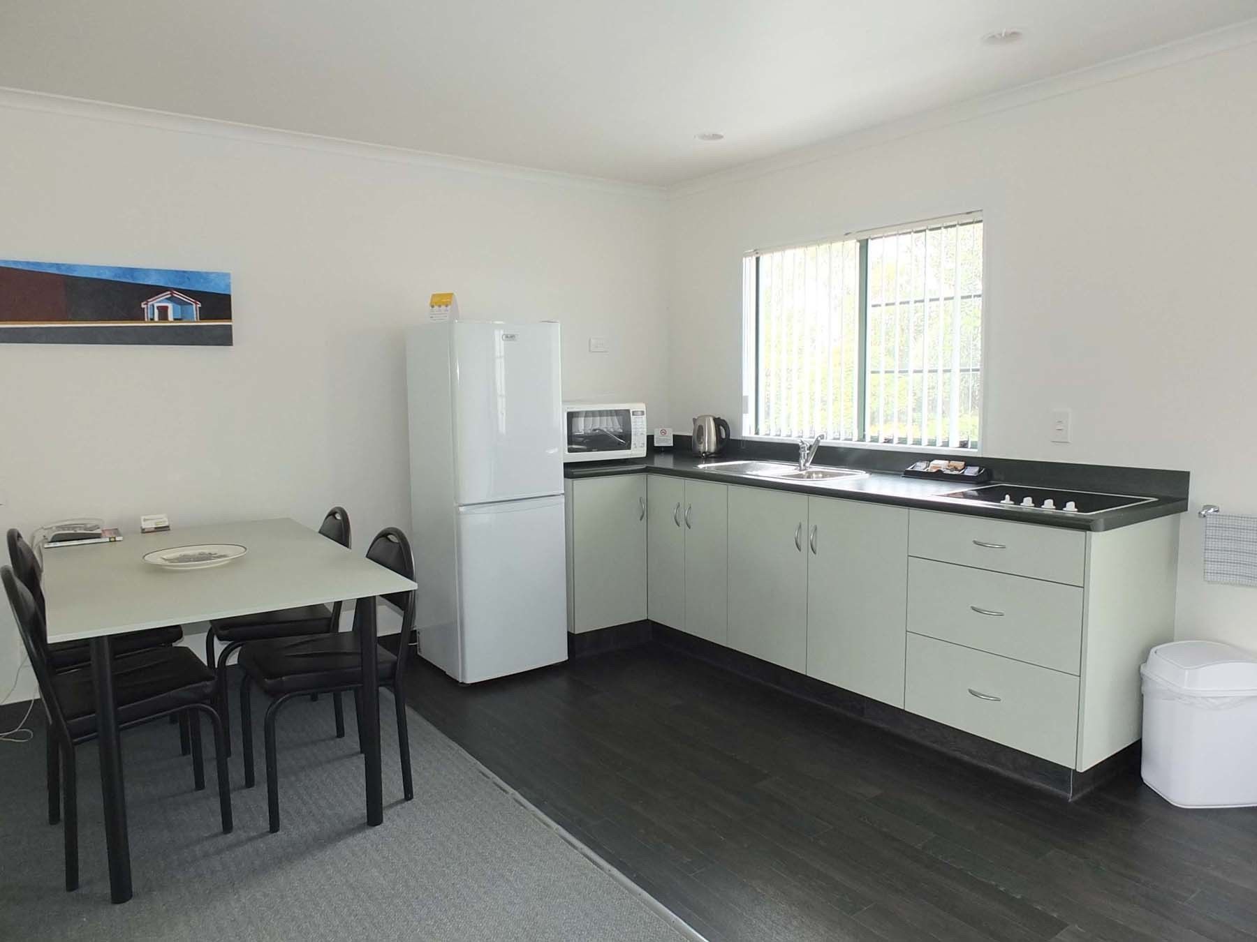 Apartment, 1 Bedroom | Private kitchen | Microwave, coffee/tea maker, electric kettle